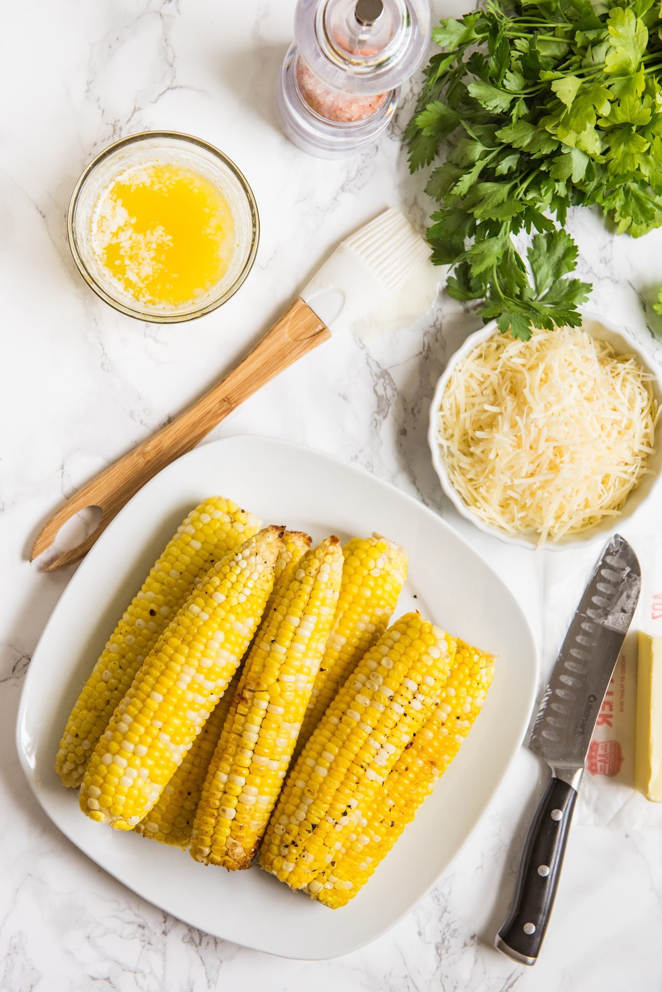 Garlic Parmesan Grilled Corn Recipe | Party recipes, entertaining tips, party ideas and more from @cydconverse