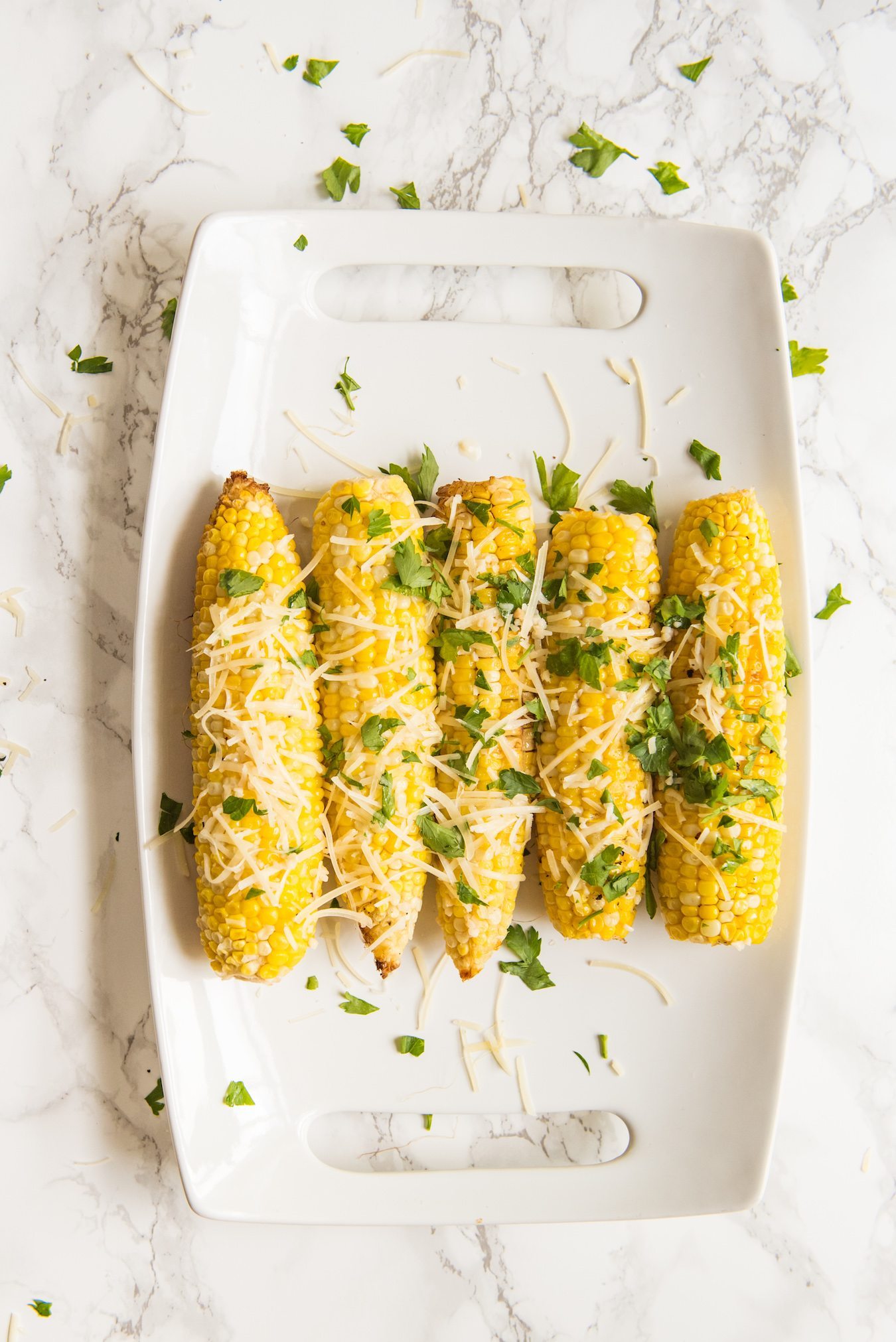 Garlic Parmesan Grilled Corn Recipe | Party recipes, entertaining tips, party ideas and more from @cydconverse