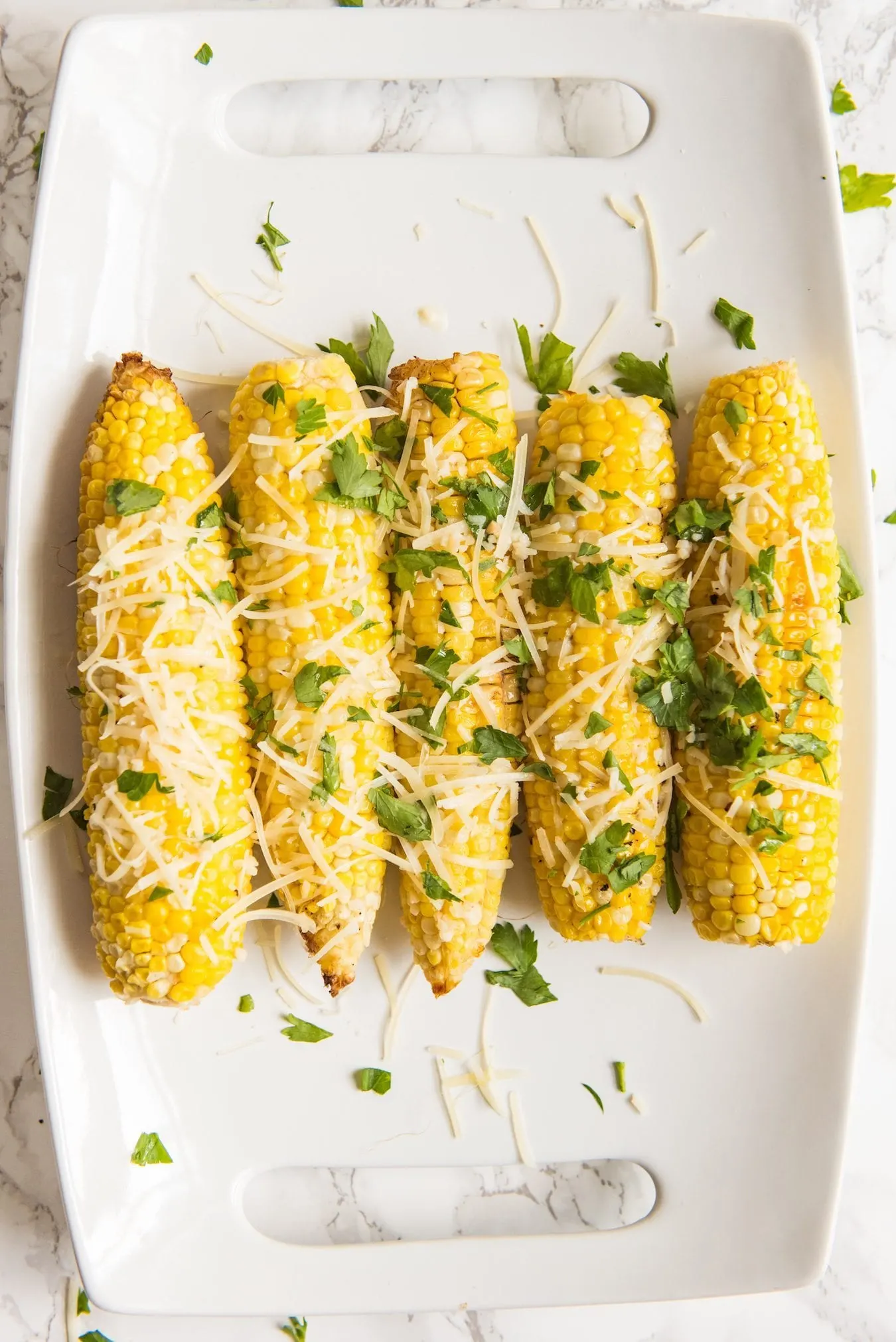 Garlic Parmesan Grilled Corn Recipe | Party recipes, entertaining tips, party ideas and more from @cydconverse