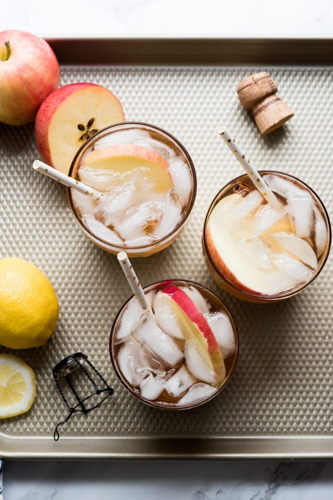 Sparkling Apple Rosé Sangria | Thanksgiving cocktail recipes, entertaining tips, holiday party ideas, fall cocktail recipes and more from @cydconverse