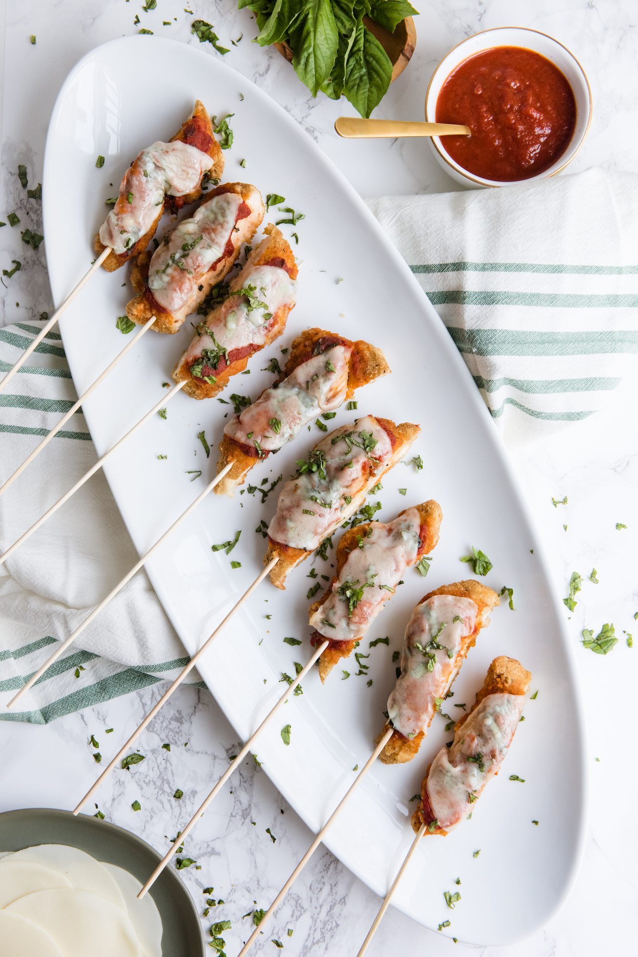 Mini Chicken Parm on a Stick | Entertaining ideas, party appetizers, party ideas and more from @cydconverse