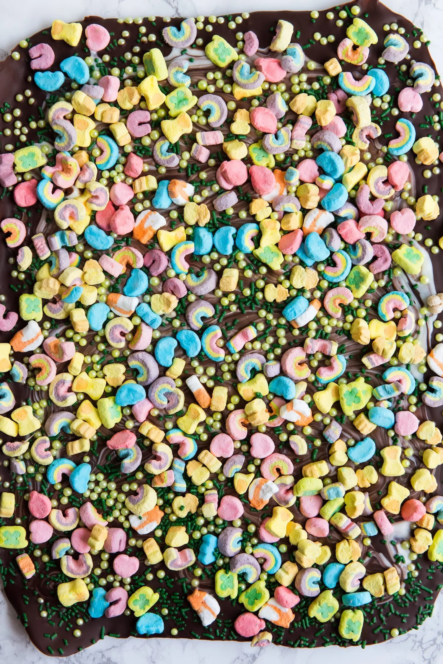 Loaded Lucky Charms St. Patrick's Day Bark | St. Patrick's Day recipes, fun St. Patrick's Day ideas for kids, entertaining ideas, party recipes and more from @cydconverse