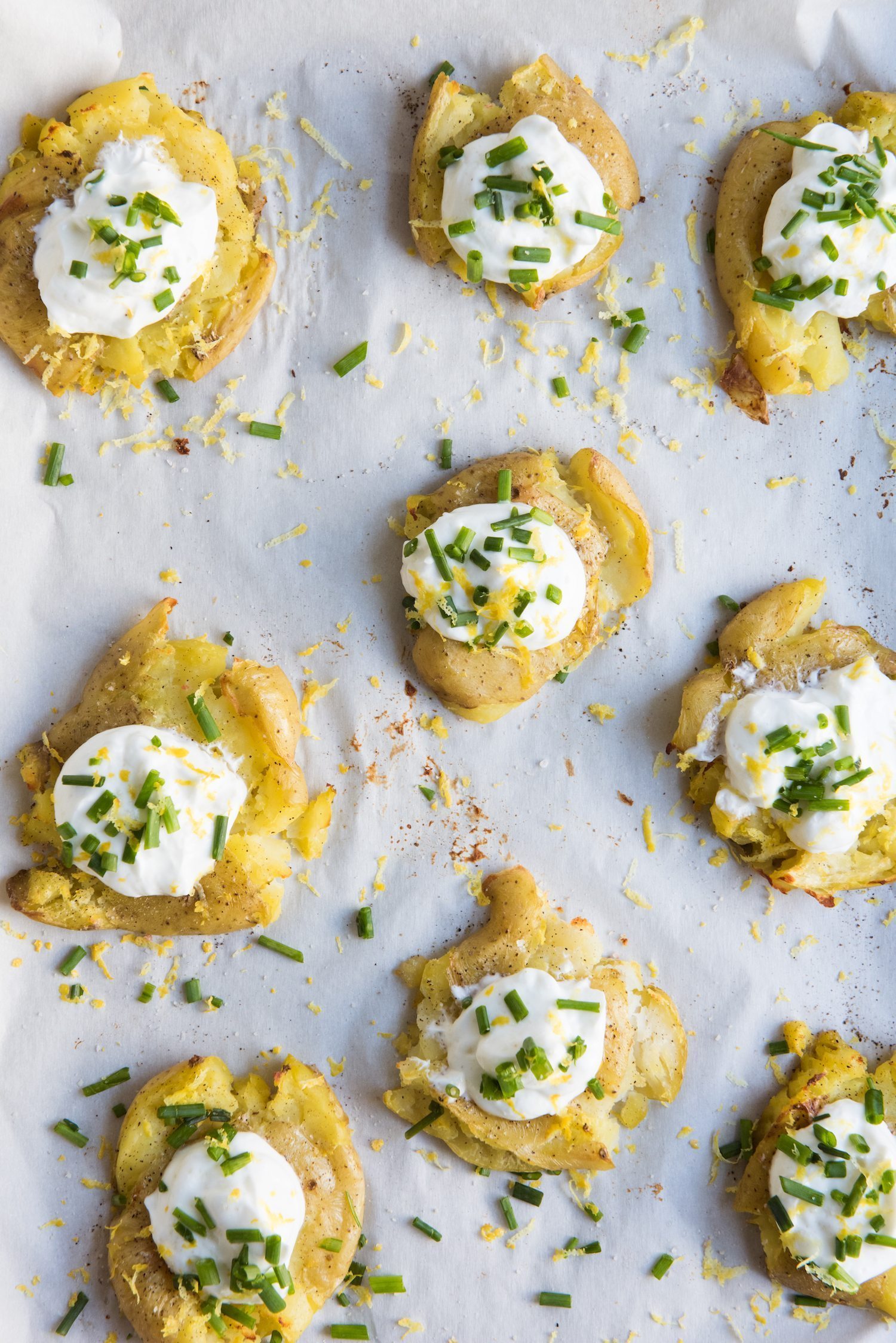 Lemon + Herb Smashed Potatoes with Greek Yogurt | Party recipes, entertaining tips, easy party appetizers, party ideas and more from @cydconverse