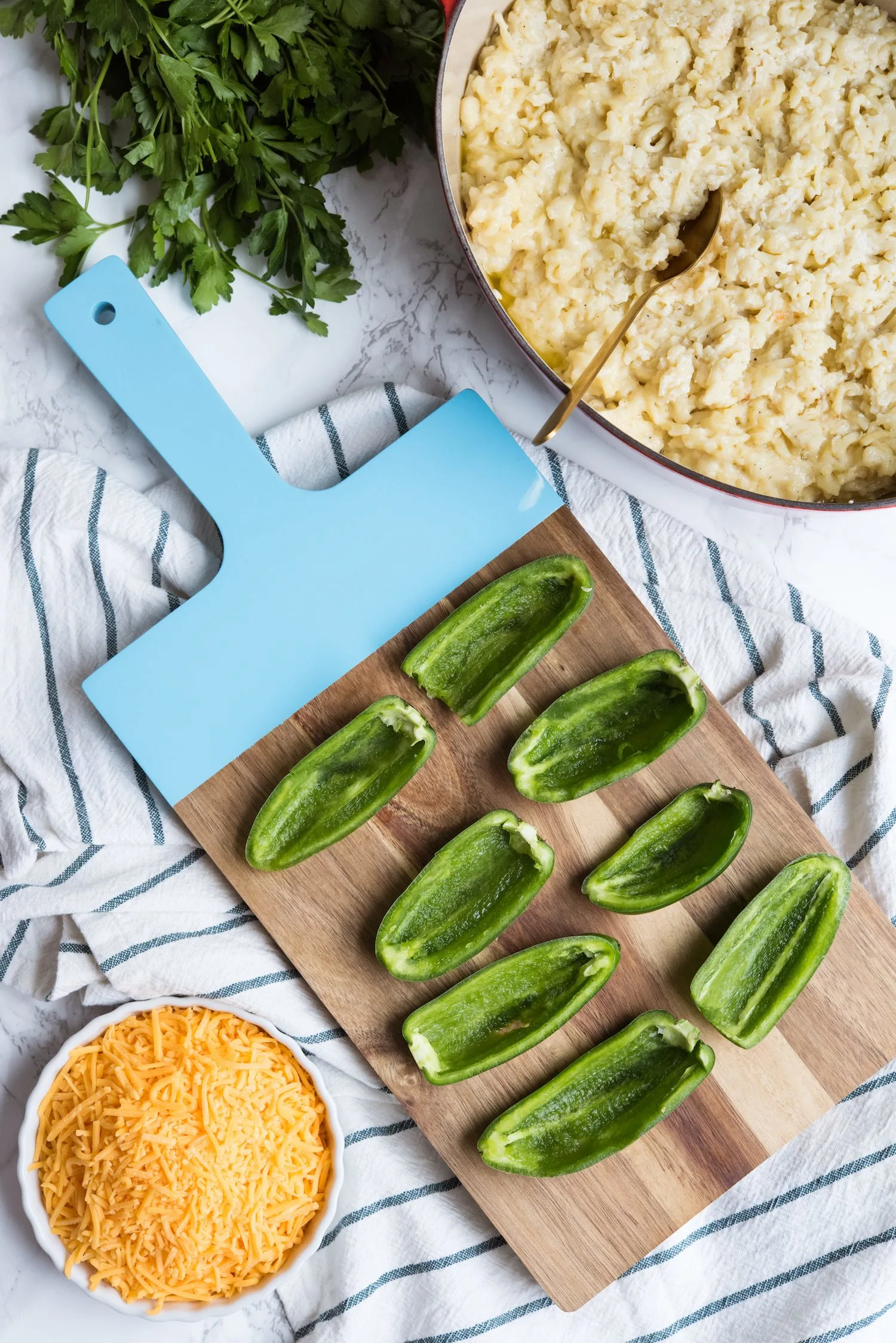 Mac + Cheese Stuffed Jalapeño Poppers | Party appetizers, entertaining tips, party ideas, home decor, cocktail recipes and more from @cydconverse