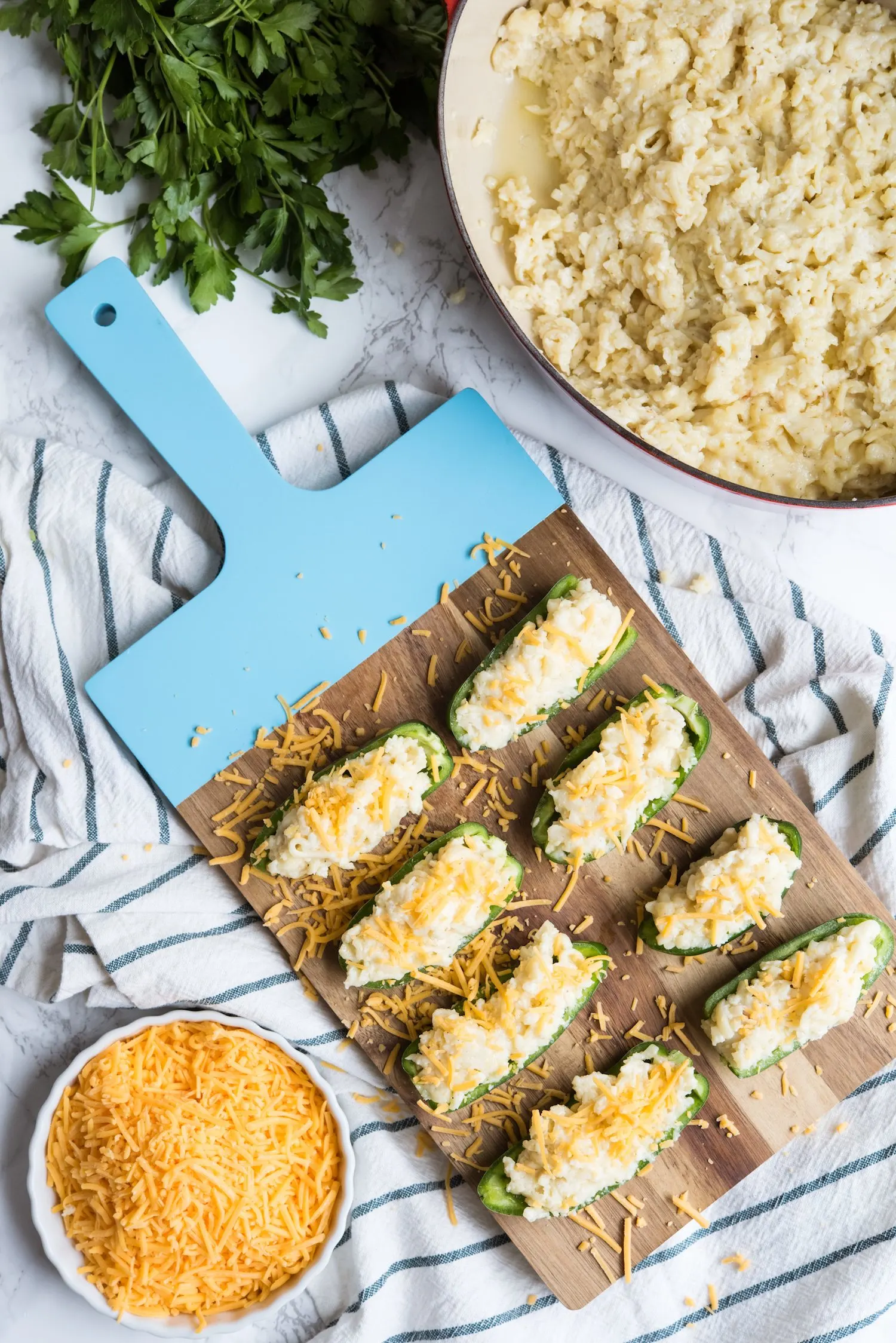 Mac + Cheese Stuffed Jalapeño Poppers | Party appetizers, entertaining tips, party ideas, home decor, cocktail recipes and more from @cydconverse