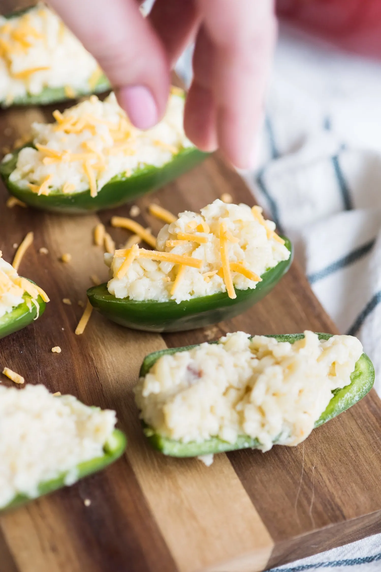 Mac + Cheese Stuffed Jalapeño Poppers | Party appetizers, entertaining tips, party ideas, home decor, cocktail recipes and more from @cydconverse