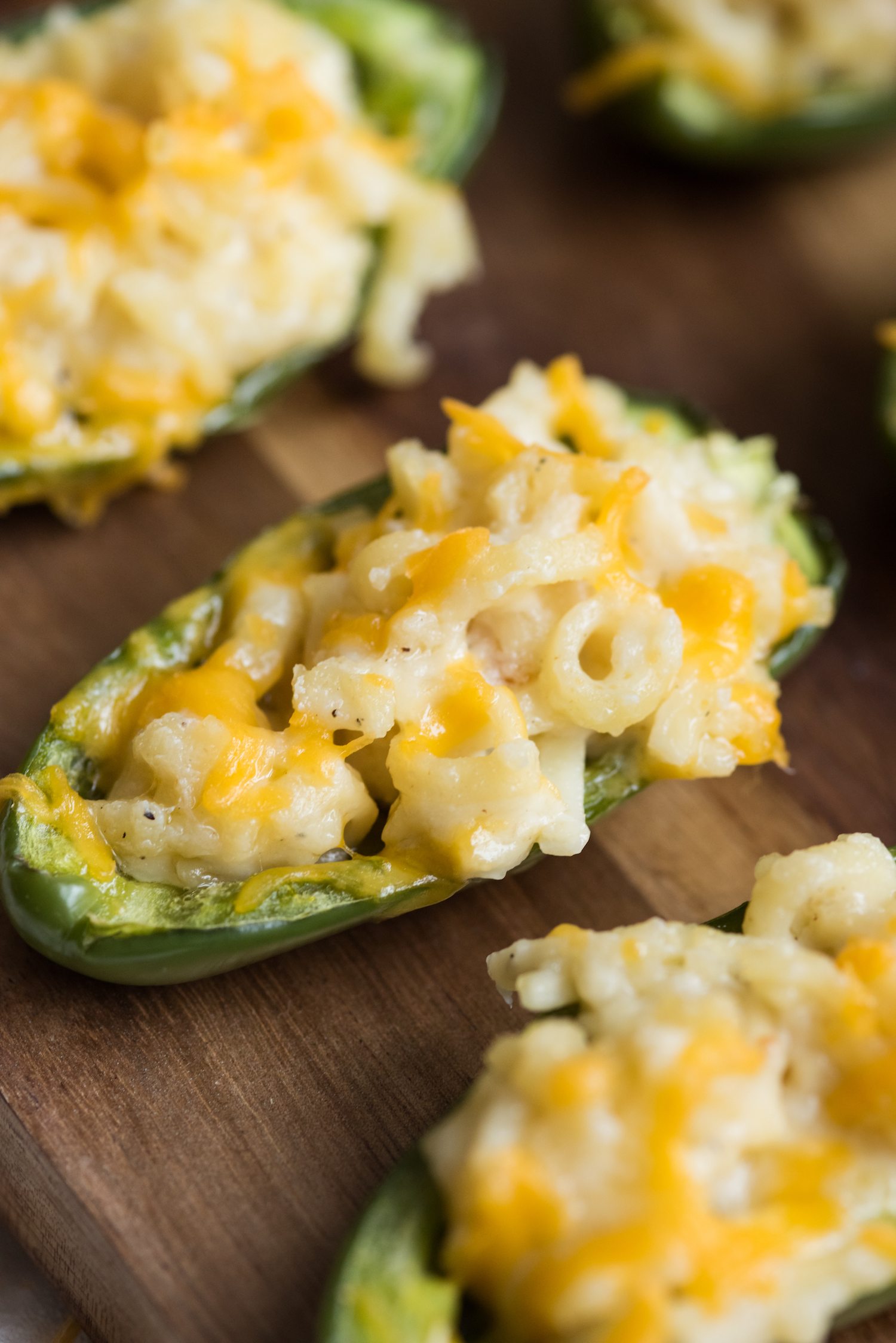 Mac + Cheese Stuffed Jalapeño Poppers | Party appetizers, entertaining tips, party ideas, home decor, cocktail recipes and more from @cydconverse
