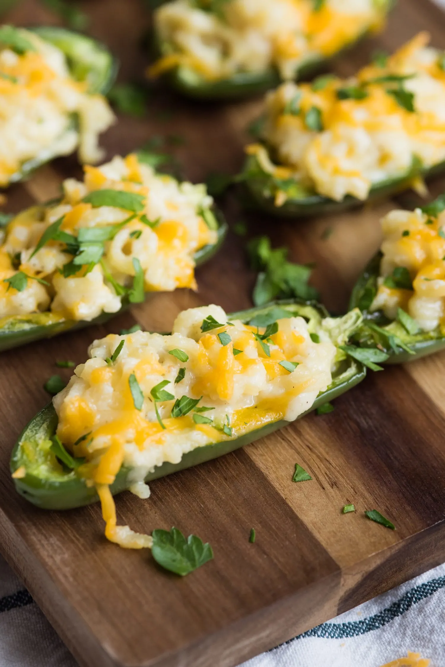 Mac + Cheese Stuffed Jalapeño Poppers | Party appetizers, entertaining tips, party ideas, home decor, cocktail recipes and more from @cydconverse