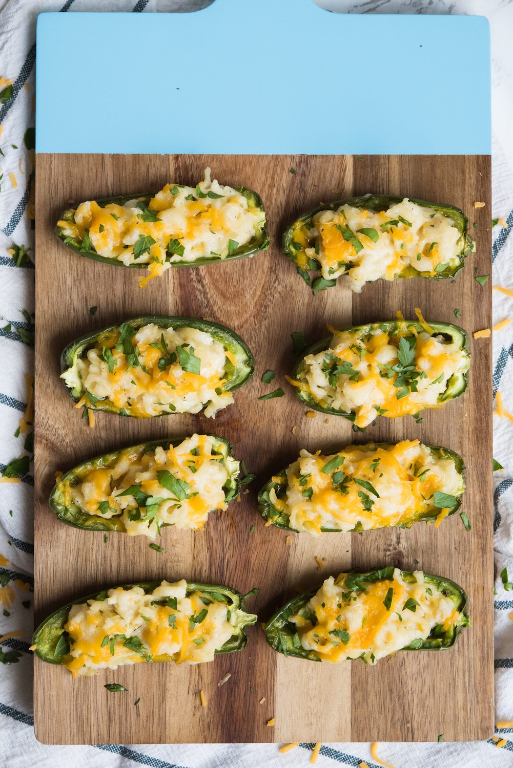 Mac + Cheese Stuffed Jalapeño Poppers | Party appetizers, entertaining tips, party ideas, home decor, cocktail recipes and more from @cydconverse