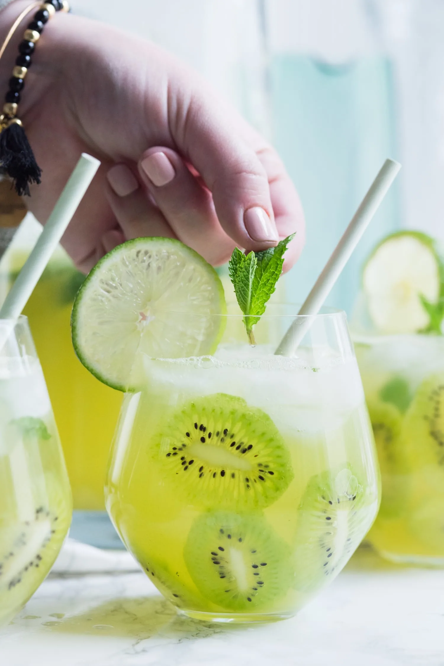 Kiwi Lime Mint Sangria Recipe | Click through for cocktail recipes, entertaining tips, party ideas, party recipes and more from @cydconverse