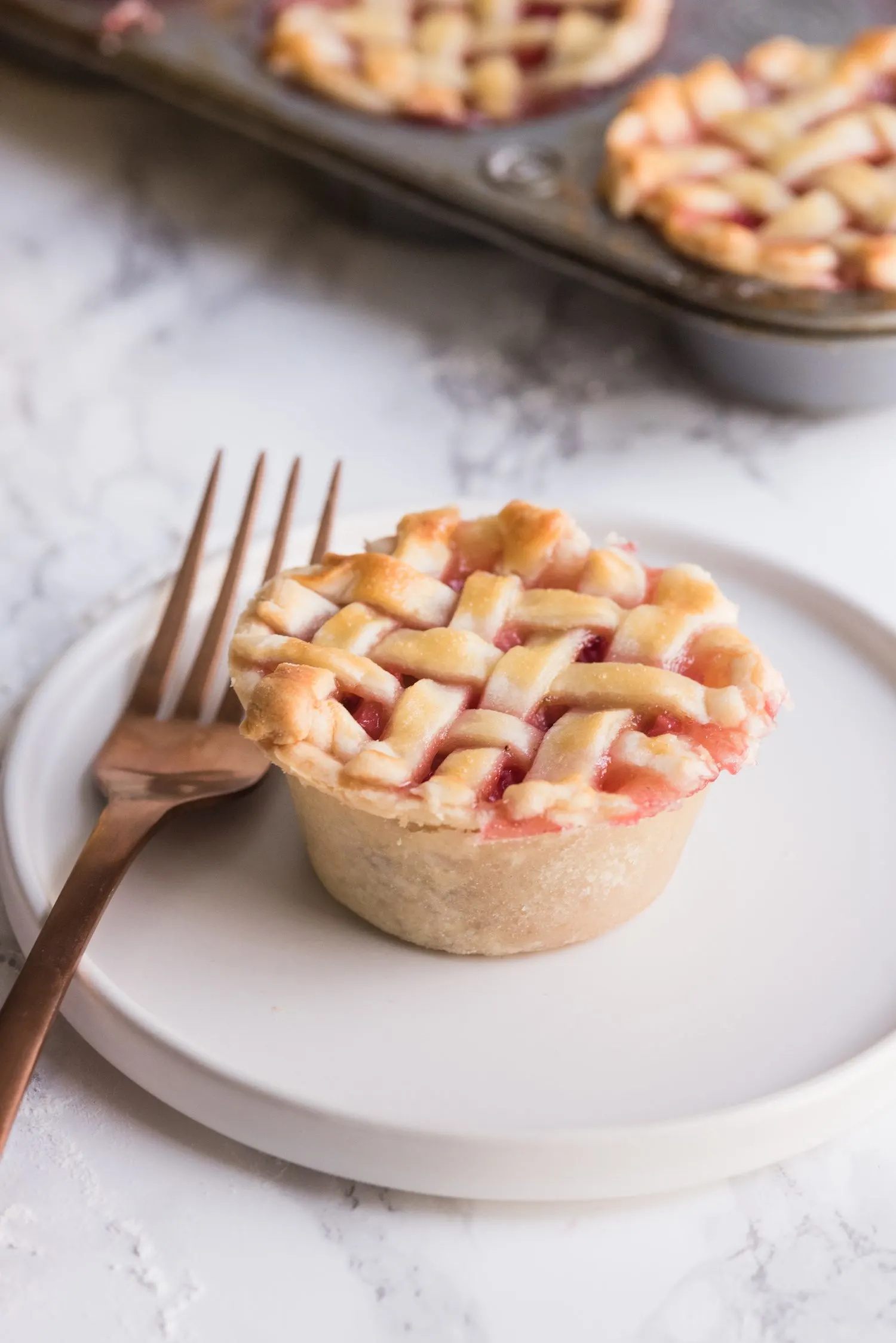 Mini Strawberry Pies in a Muffin Tin | Click through for entertaining tips, recipes, party ideas, cocktail recipes and more from @cydconverse