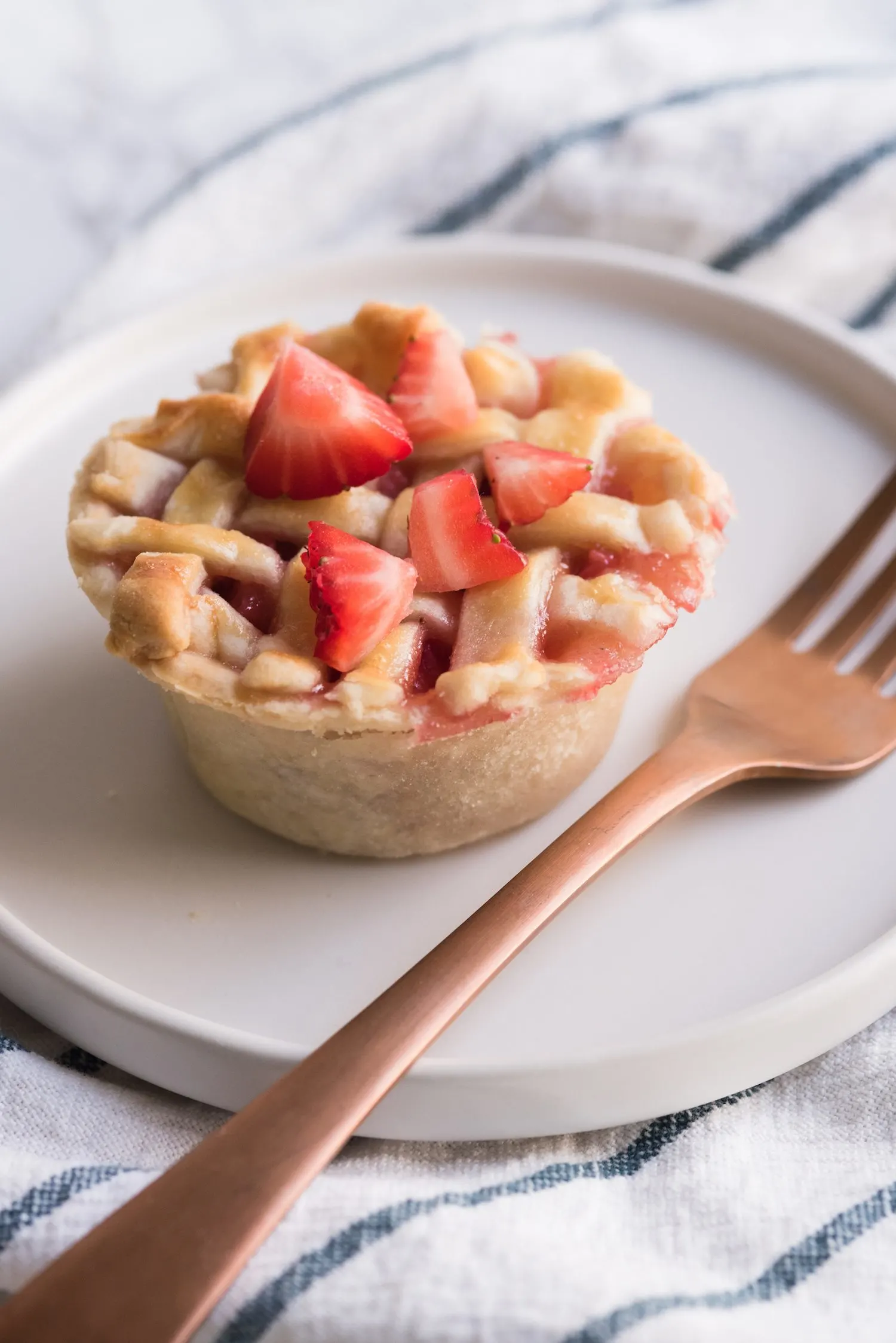 Mini Strawberry Pies in a Muffin Tin | Click through for entertaining tips, recipes, party ideas, cocktail recipes and more from @cydconverse