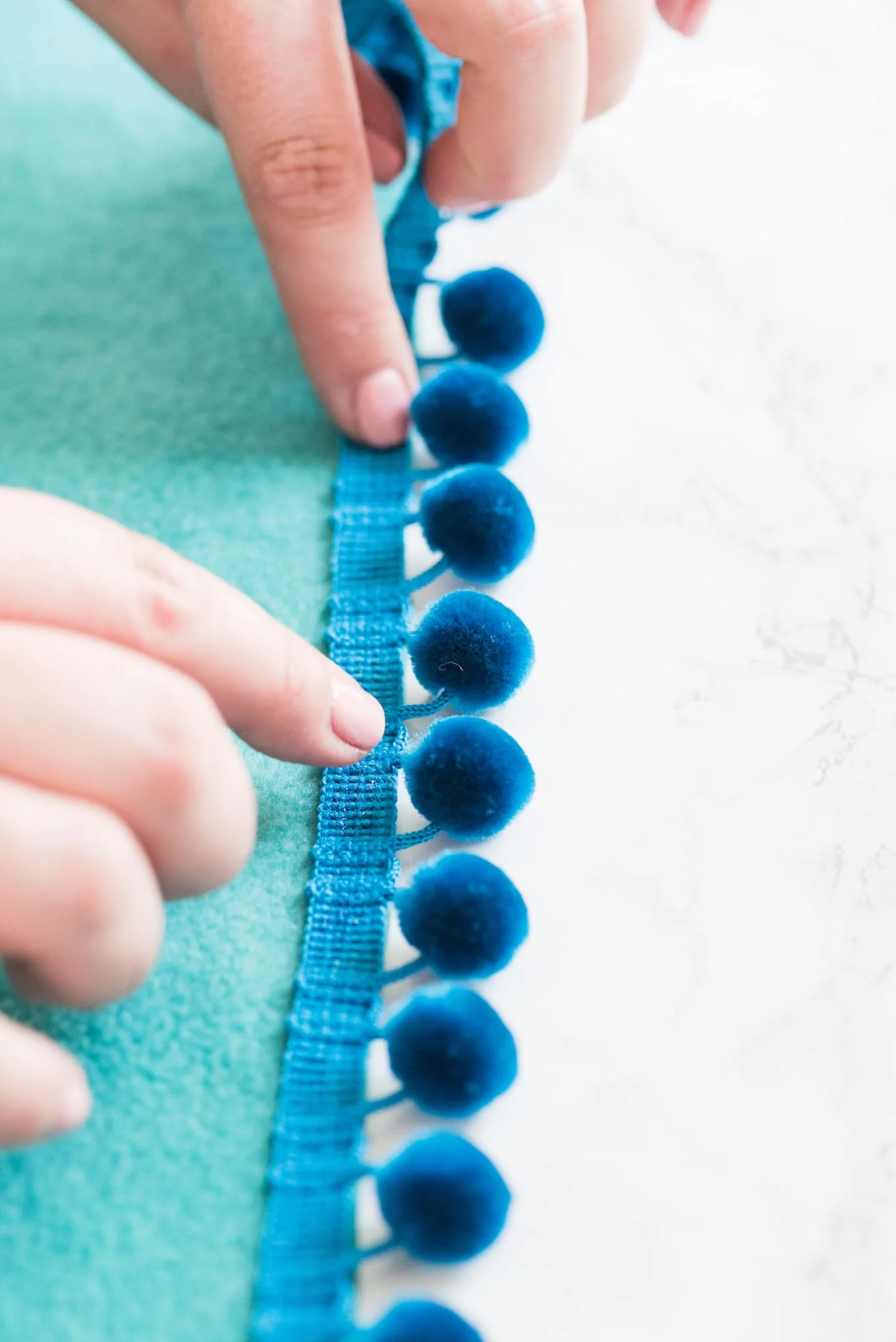 DIY No-Sew Pom Pom Pool + Picnic Blankets - The Sweetest Occasion