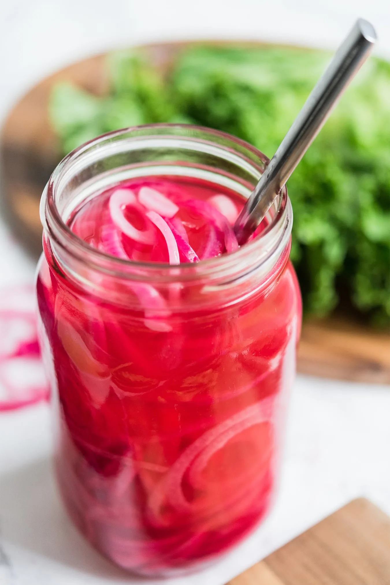 https://thesweetestoccasion.com/wp-content/uploads/2018/07/party-ideas-pickled-red-onions-recipe-2.jpg.webp