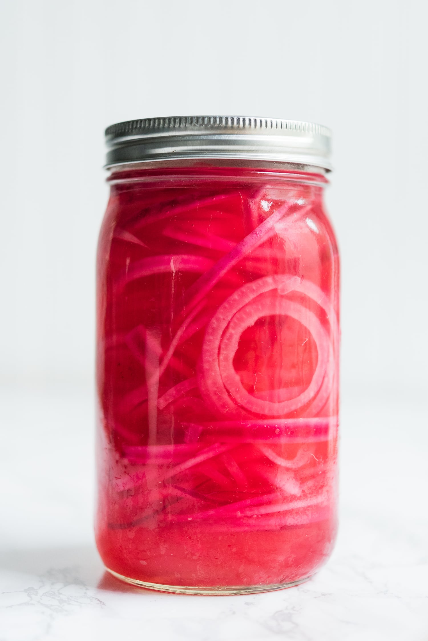 The best easy pickled red onions recipe! Visit The Sweetest Occasion for party ideas, party recipes, easy appetizer recipes and more!