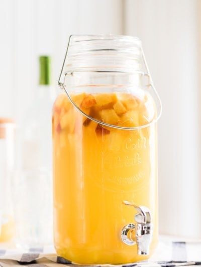 White Wine Sangria Recipe with Peaches + Pineapple thumbnail