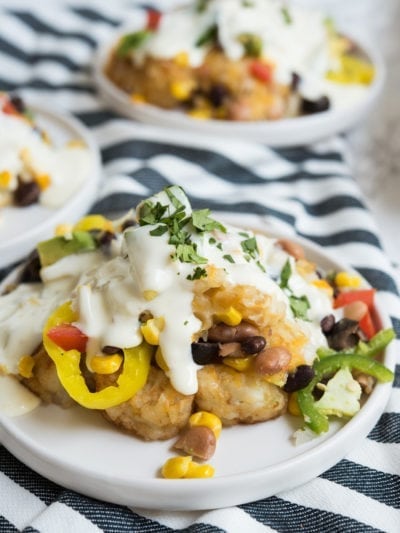 Loaded Game Day Nacho Tots with Creamy Crockpot Queso Blanco thumbnail