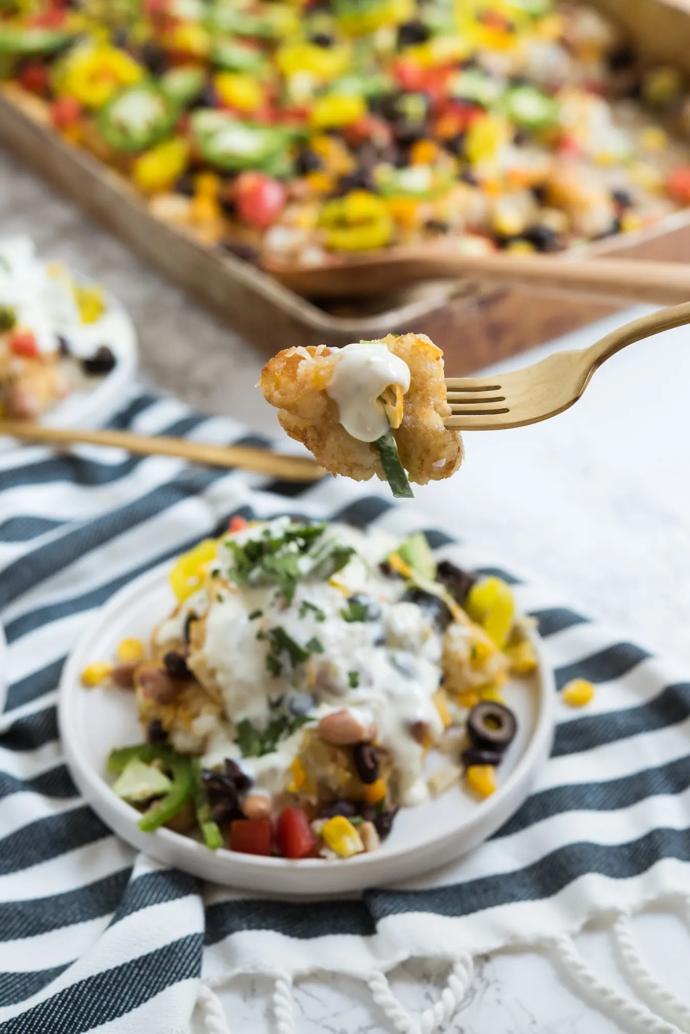 Easy game day recipes - loaded tater tot nachos from @cydconverse!