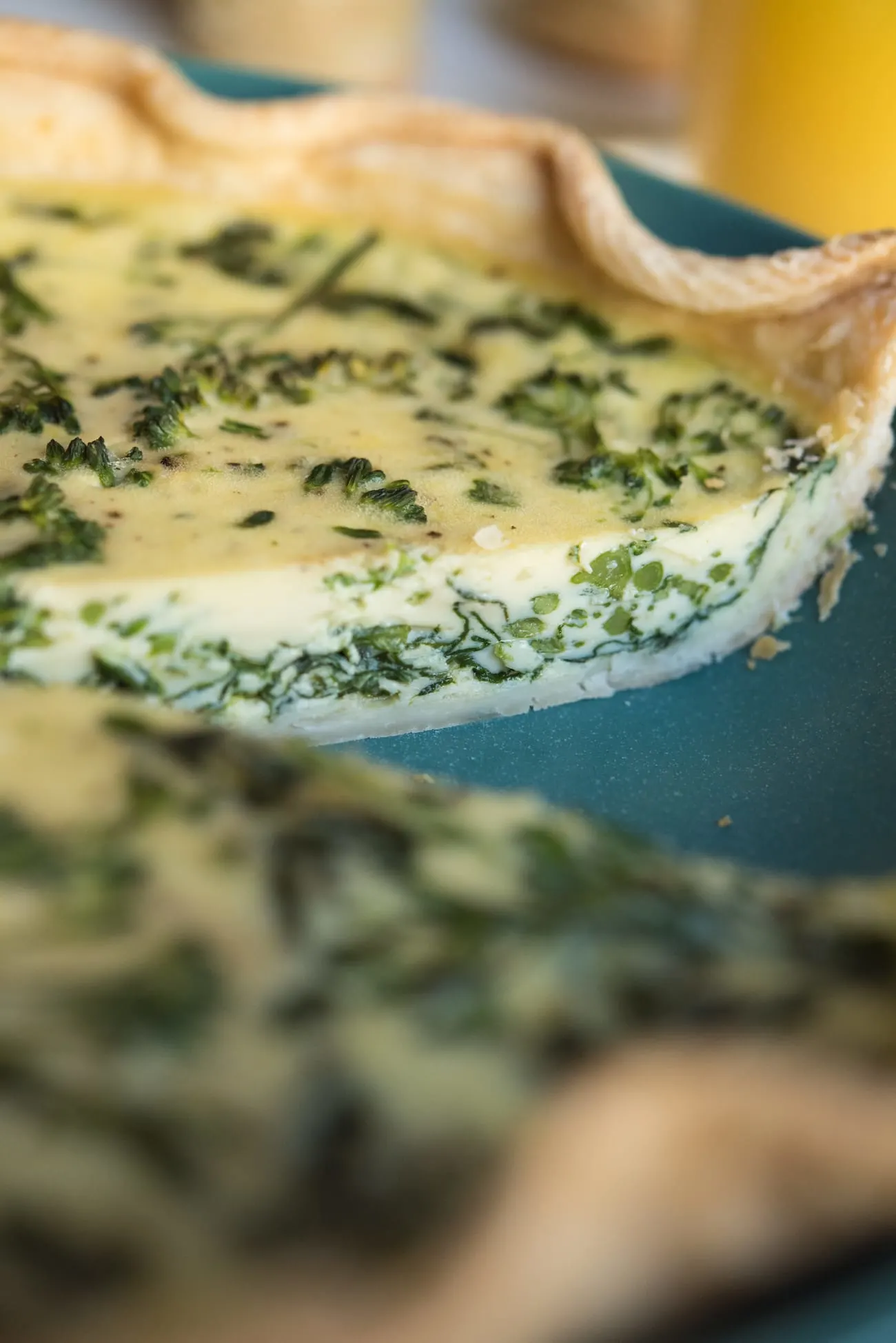 Spinach and Broccolini Goat Cheese Quiche | Friendsgiving recipes, Thanksgiving recipes, party ideas and entertaining tips from entertaining blog @cydconverse