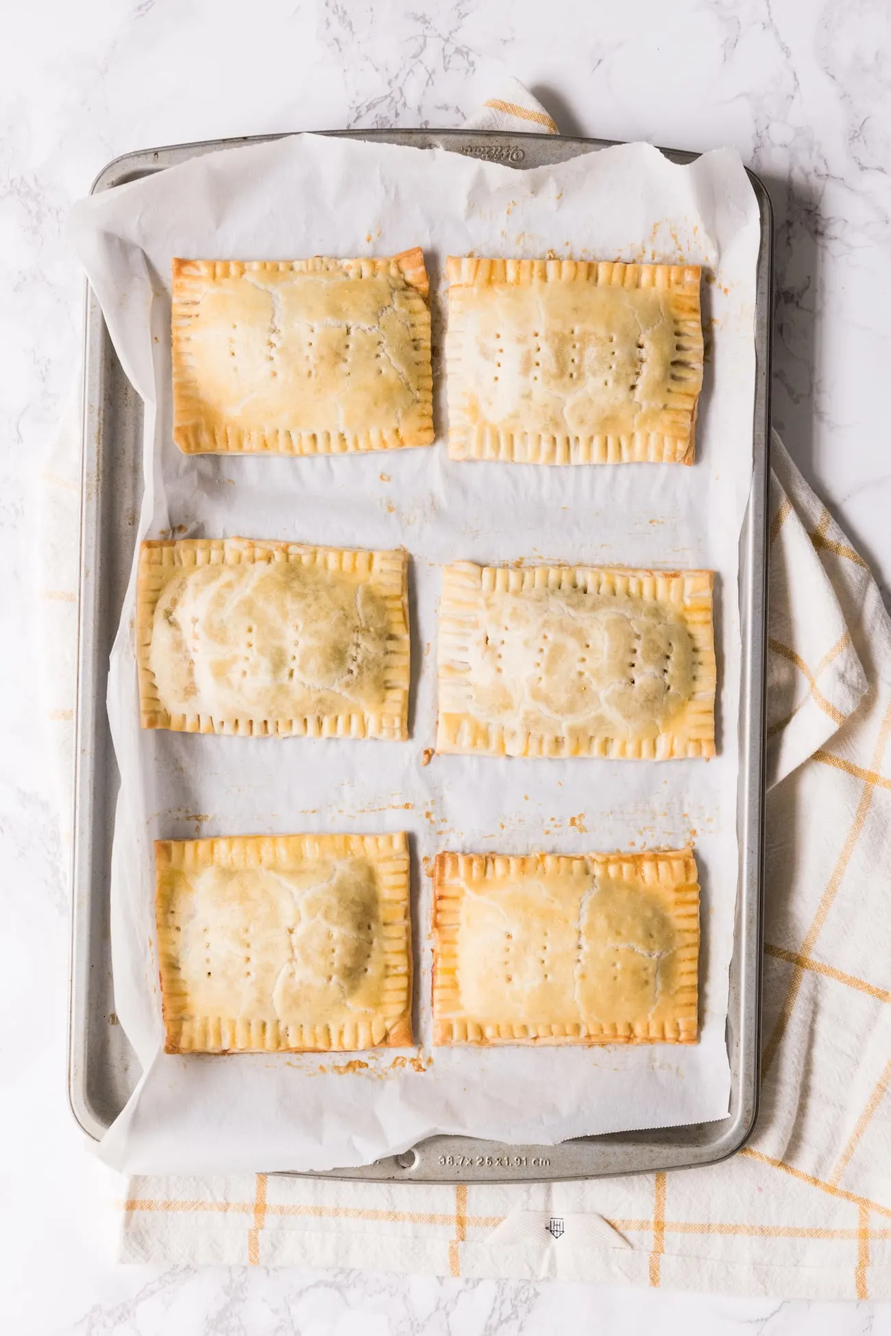 Make these crazy good homemade veggie taco pop tarts for your next game day party! Visit entertaining blog @cydconverse for the recipe