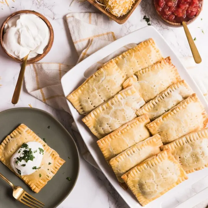 Make these crazy good homemade veggie taco pop tarts for your next game day party! Visit entertaining blog @cydconverse for the recipe