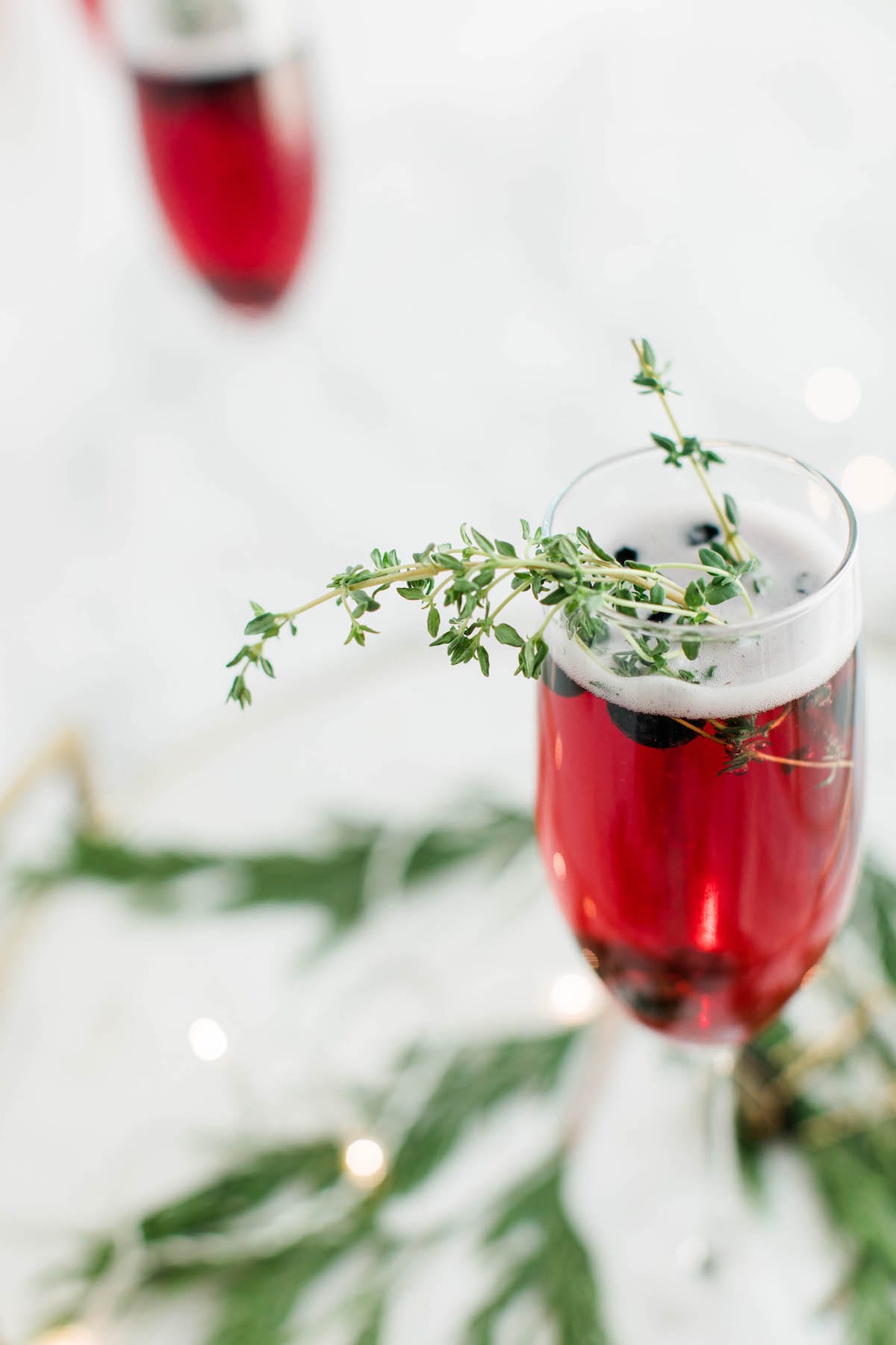 Raise a Glass with these Blueberry and Thyme Champagne Cocktails - The Sweetest Occasion