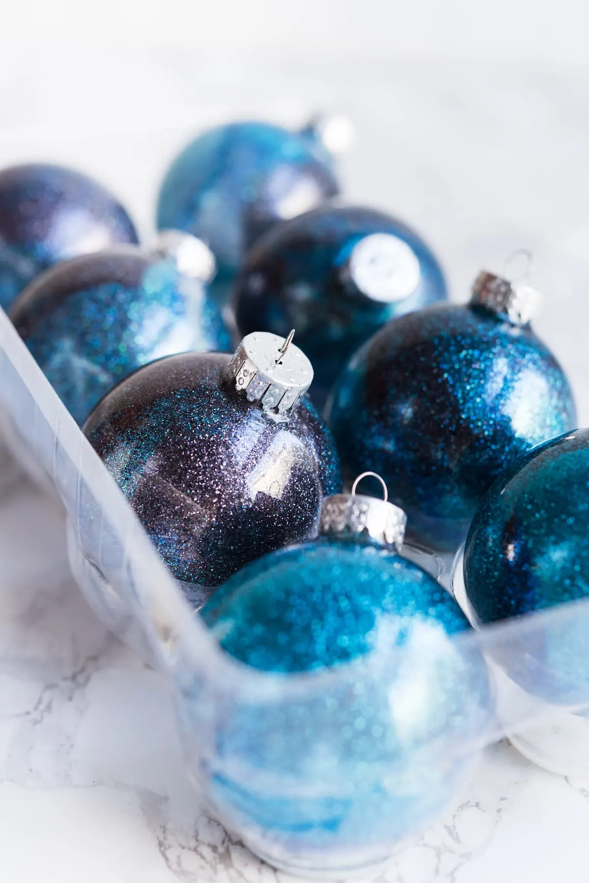 DIY Galaxy Homemade Ornaments | DIY ornaments, glitter ornaments, Christmas entertaining and entertaining tips from entertaining blog @cydconverse