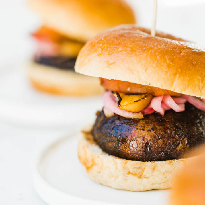 Grilled Portobello Burgers with Grilled Peaches + Pickled Red Onions | Easy grilling recipes for summer parties from @cydconverse