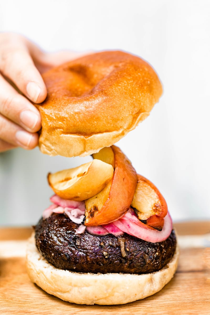 Grilled Portobello Burgers with Grilled Peaches + Pickled Red Onions | Easy grilling recipes for summer parties from @cydconverse