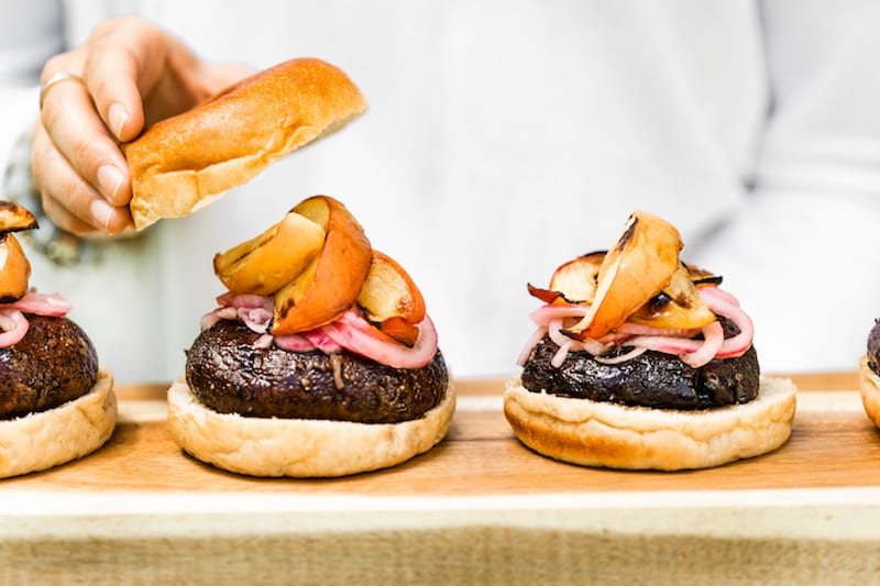 Grilled Portobello Burgers with Grilled Peaches + Pickled Red Onions | Easy grilling recipes for summer parties from @cydconverse