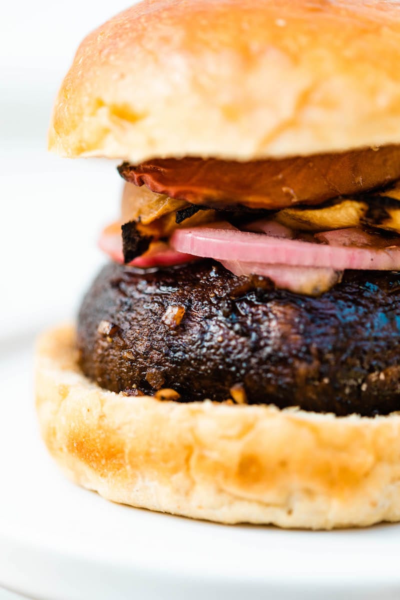 Grilled Portobello Burgers with Grilled Peaches + Pickled Red Onions | Easy grilling recipes for summer parties from @cydconverse