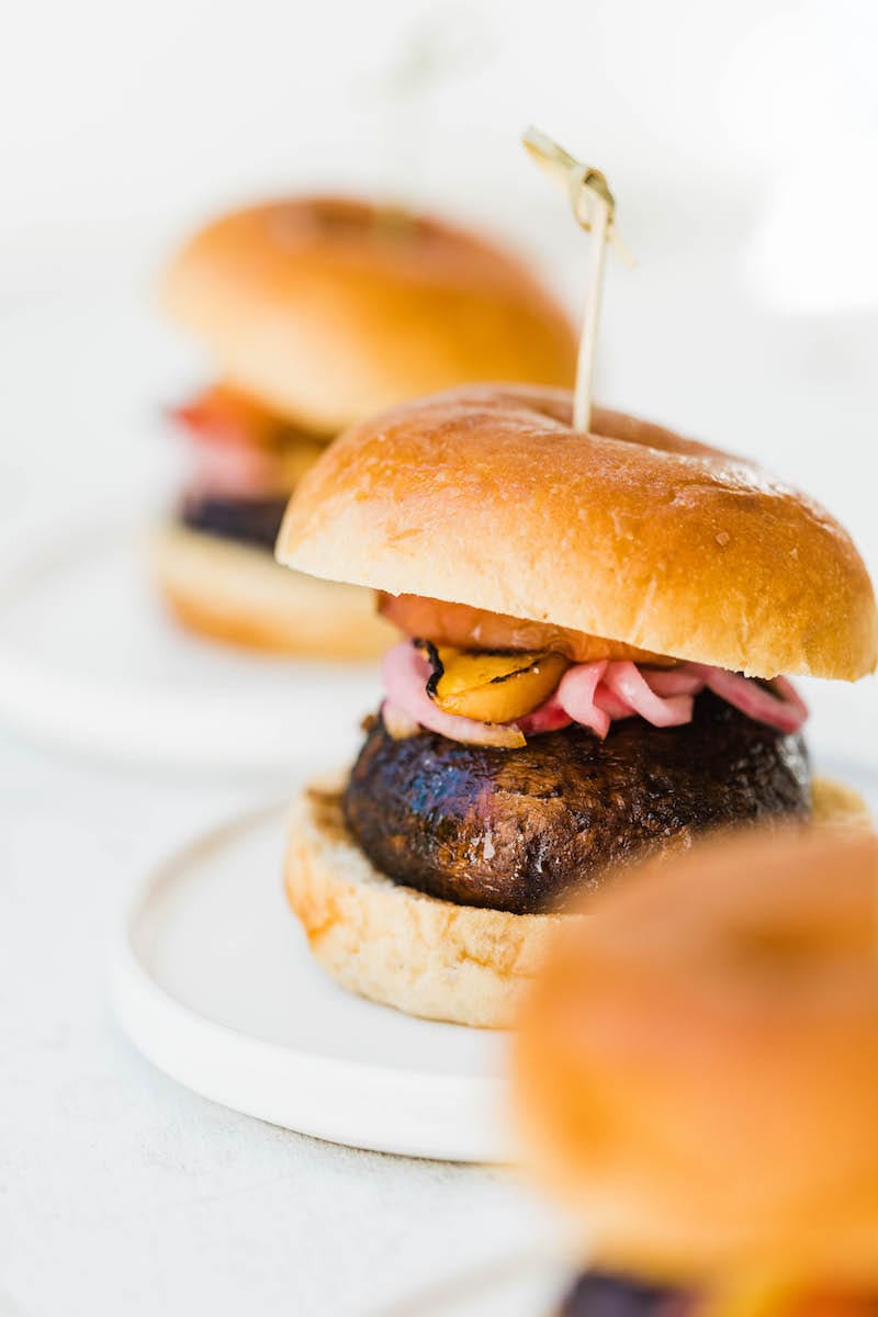 Grilled Portobello Burgers with Grilled Peaches + Pickled Red Onions | Easy grilling recipes for summer parties from @cydconverse