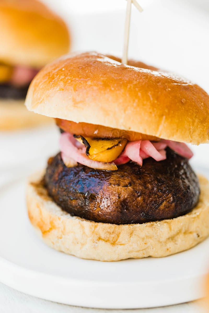 Grilled Portobello Burgers with Grilled Peaches + Pickled Red Onions | Easy grilling recipes for summer parties from @cydconverse